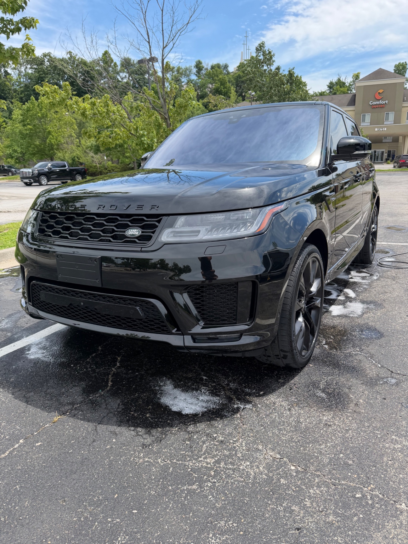 Black Range Rover Sport with a deep gloss finish after detailing