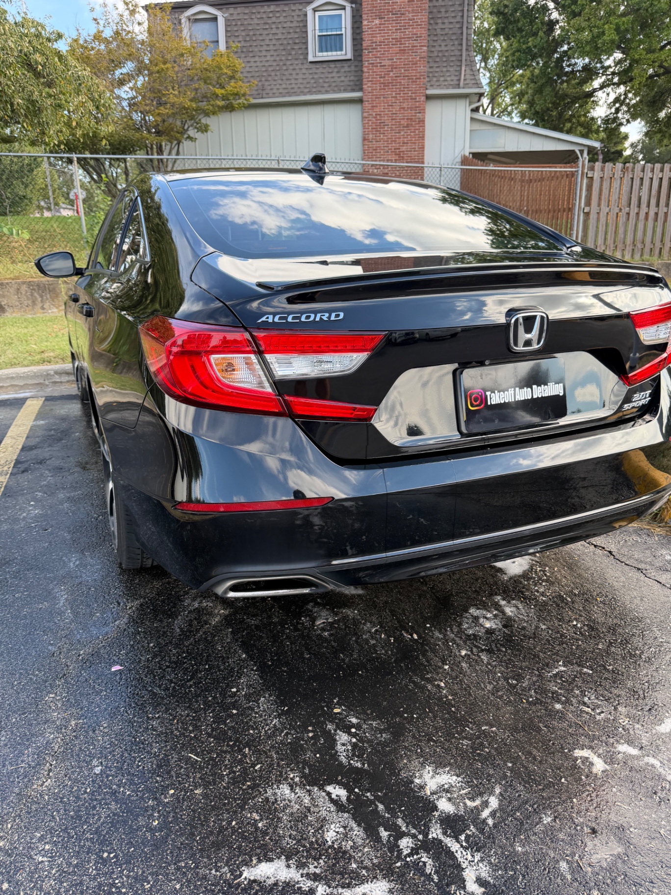 Gloss black Honda Accord 2.0T Sport with a mirror-like finish after an exterior detail